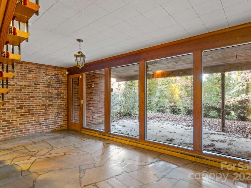 702 Forest Hill Drive, Shelby, NC 28150.  MLS# CAR4185280, YatesRealty ID 4119. ...with huge windows and views of the covered patio.