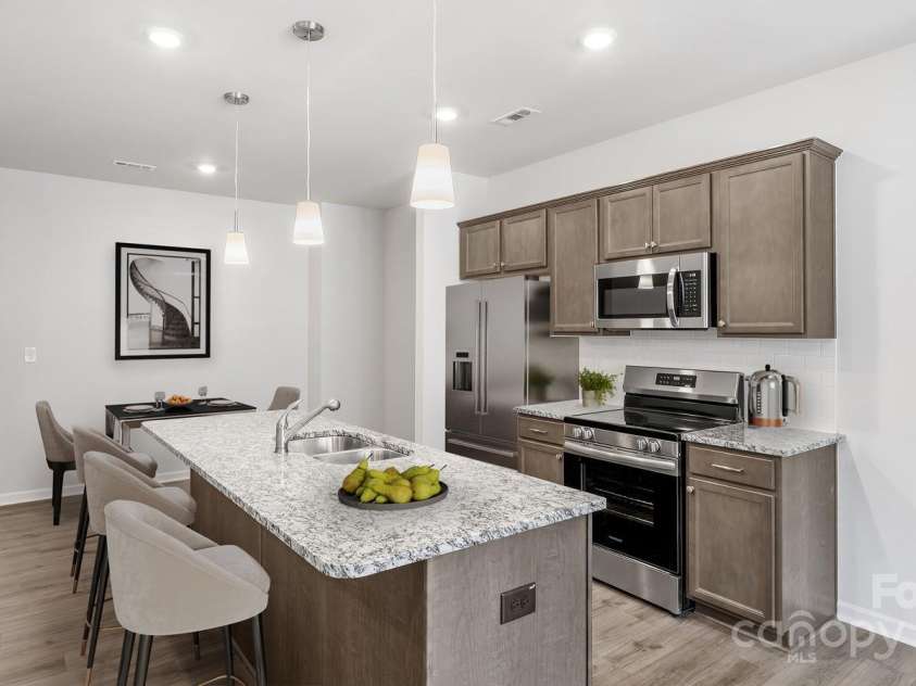 2940 Sloan Drive, Charlotte, NC 28208.  MLS# CAR4288735, YatesRealty ID 412. 