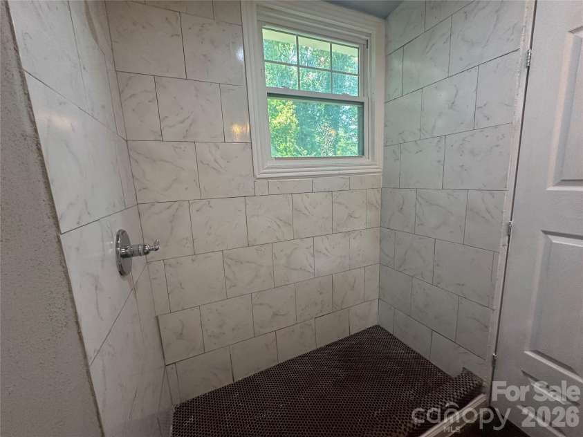 1005 William Drive, Winston Salem, NC 27127.  MLS# CAR4410567, YatesRealty ID 41213. Rear bathRear bath