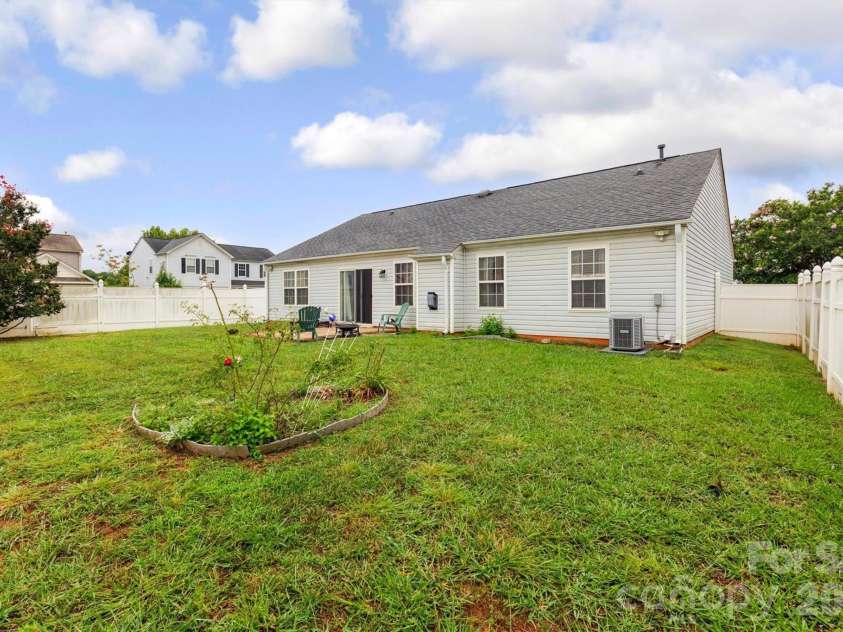 9704 Aventide Lane, Charlotte, NC 28215.  MLS# CAR4403212, YatesRealty ID 41214. Backyard View B