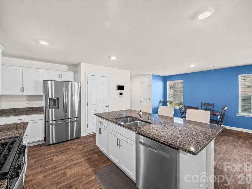 2014 Redstone Drive, York, SC 29745.  MLS# CAR4411044, YatesRealty ID 41222. Garage entry beside fridge