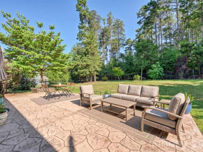 16408 Mckee Ridge Drive, Charlotte, NC 28278.  MLS# CAR4406733, YatesRealty ID 41225. Virtually staged back patio