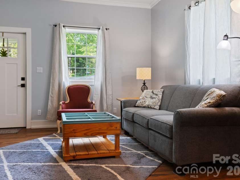 636 Trade Street, Tryon, NC 28782.  MLS# CAR4410620, YatesRealty ID 41236. 