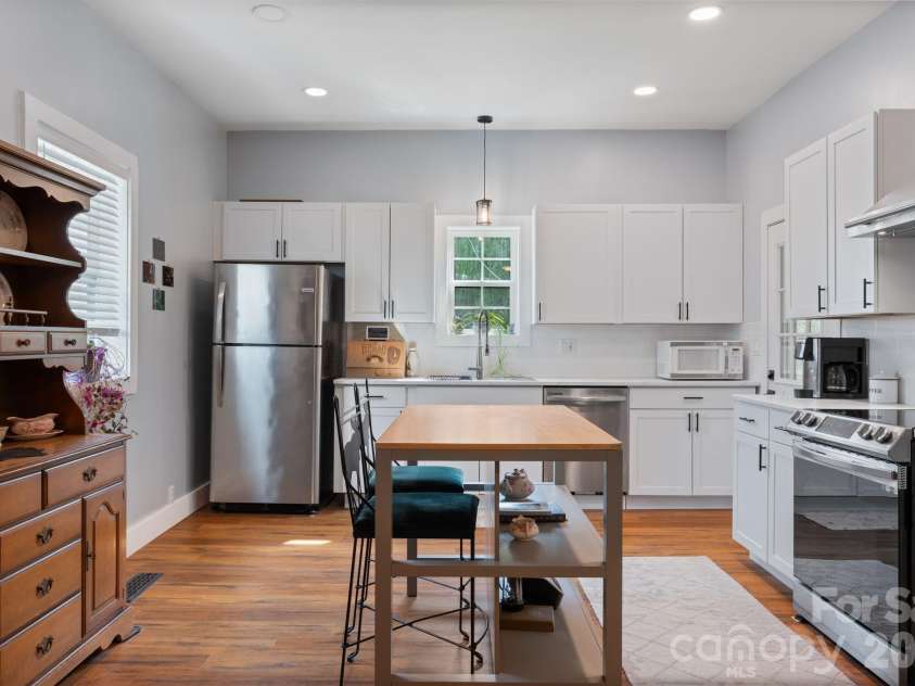 636 Trade Street, Tryon, NC 28782.  MLS# CAR4410620, YatesRealty ID 41236. 