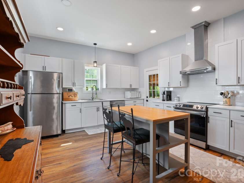 636 Trade Street, Tryon, NC 28782.  MLS# CAR4410620, YatesRealty ID 41236. 