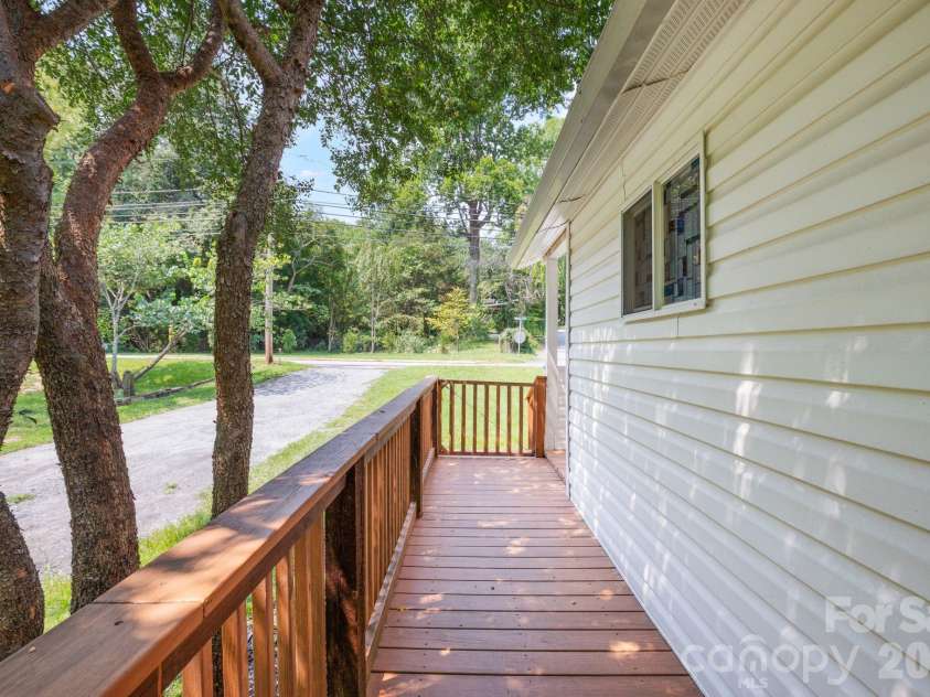 636 Trade Street, Tryon, NC 28782.  MLS# CAR4410620, YatesRealty ID 41236. 