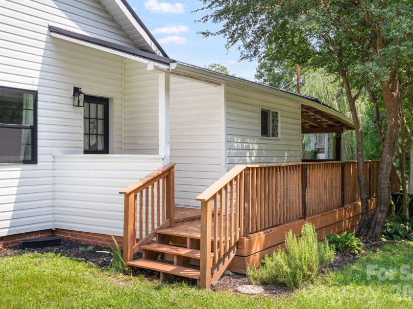 636 Trade Street, Tryon, NC 28782.  MLS# CAR4410620, YatesRealty ID 41236. 