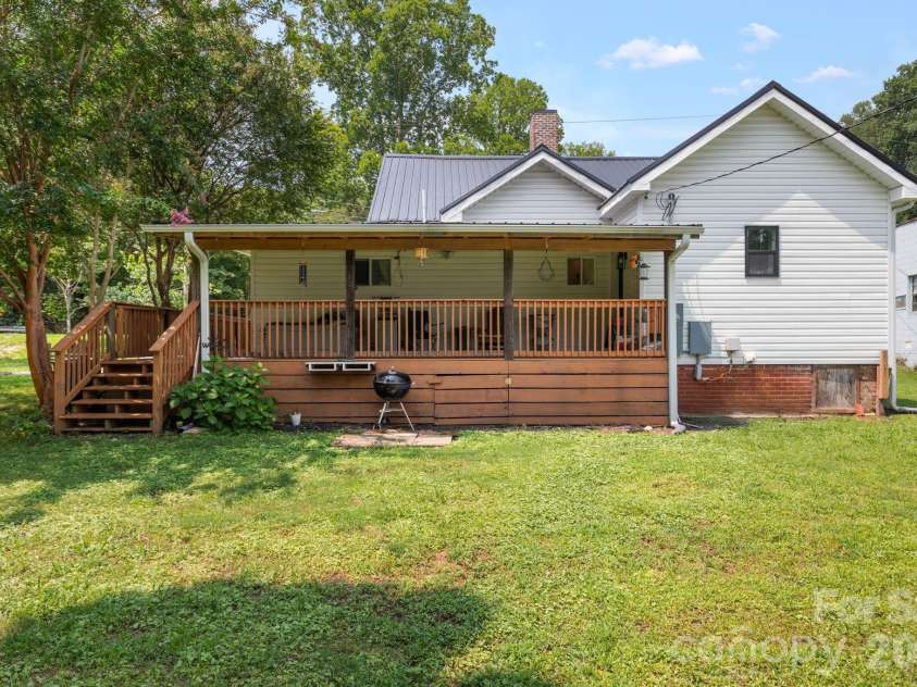 636 Trade Street, Tryon, NC 28782.  MLS# CAR4410620, YatesRealty ID 41236. 