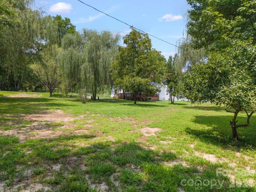 636 Trade Street, Tryon, NC 28782.  MLS# CAR4410620, YatesRealty ID 41236. 