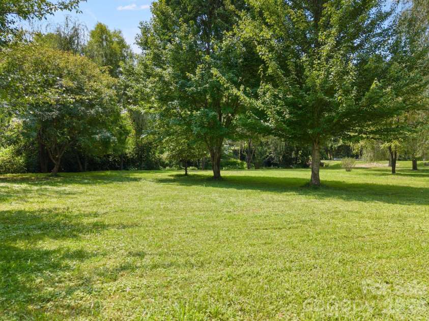 636 Trade Street, Tryon, NC 28782.  MLS# CAR4410620, YatesRealty ID 41236. 
