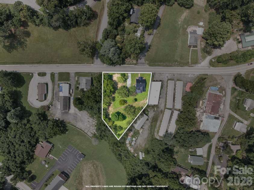 636 Trade Street, Tryon, NC 28782.  MLS# CAR4410620, YatesRealty ID 41236. 