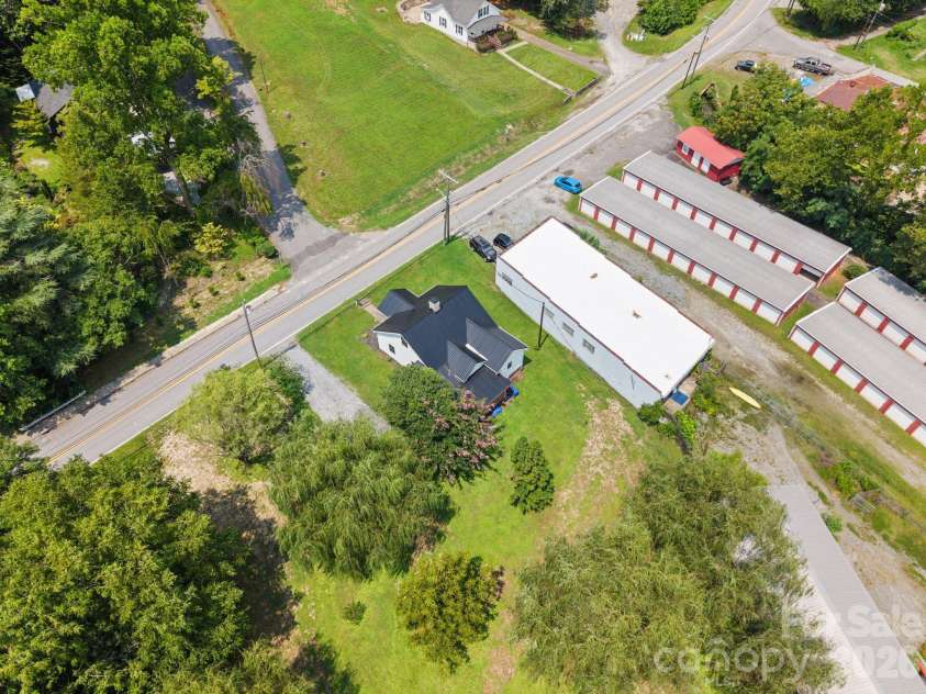 636 Trade Street, Tryon, NC 28782.  MLS# CAR4410620, YatesRealty ID 41236. 