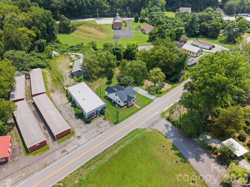 636 Trade Street, Tryon, NC 28782.  MLS# CAR4410620, YatesRealty ID 41236. 