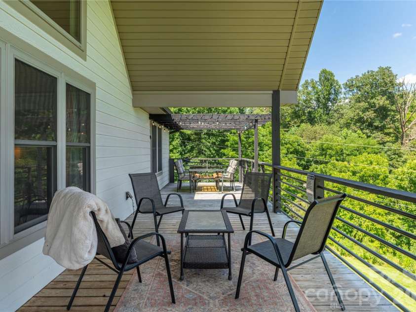68 Clear View Drive, Mars Hill, NC 28754.  MLS# CAR4410650, YatesRealty ID 41241. Expansive, partially covered deck