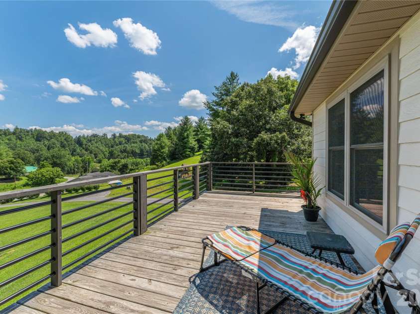 68 Clear View Drive, Mars Hill, NC 28754.  MLS# CAR4410650, YatesRealty ID 41241. Wrap-around-driveway access