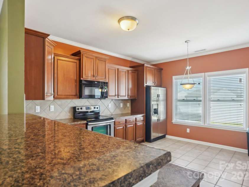 616 Smokehouse Lane, Albemarle, NC 28001.  MLS# CAR4231817, YatesRealty ID 4125. Eat in Kitchen
