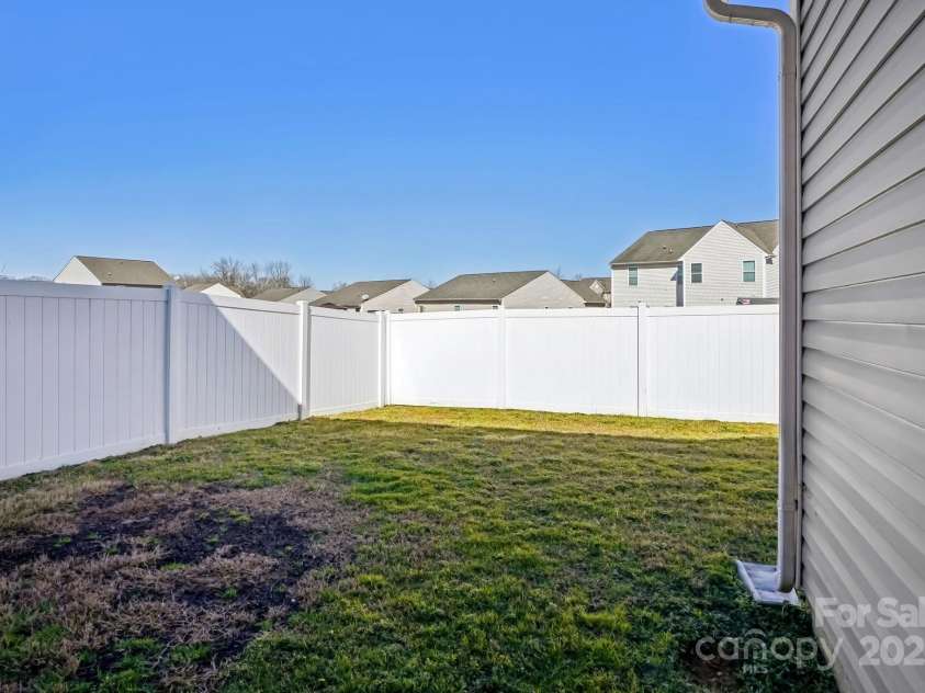616 Smokehouse Lane, Albemarle, NC 28001.  MLS# CAR4231817, YatesRealty ID 4125. Fenced in backyard