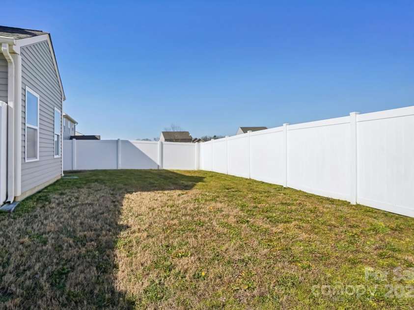 616 Smokehouse Lane, Albemarle, NC 28001.  MLS# CAR4231817, YatesRealty ID 4125. Fenced in backyard