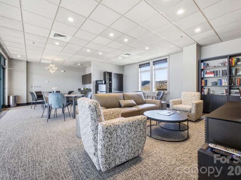 21 Battery Park Avenue, Asheville, NC 28801.  MLS# CAR4366856, YatesRealty ID 4126. Community Penthouse Rec Room