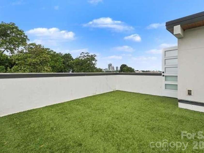 1300 10th Street, Charlotte, NC 28204.  MLS# CAR4386950, YatesRealty ID 41261. Large rooftop deck