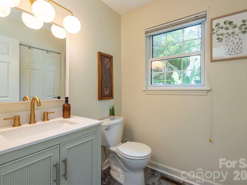 90 Pine Forest Drive, Weaverville, NC 28787.  MLS# CAR4407692, YatesRealty ID 41271. Guest bathroom