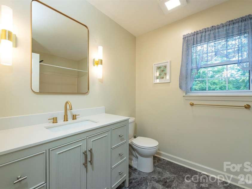 90 Pine Forest Drive, Weaverville, NC 28787.  MLS# CAR4407692, YatesRealty ID 41271. Guest bathroom on second floor