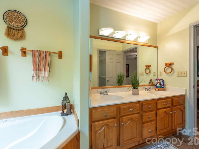90 Pine Forest Drive, Weaverville, NC 28787.  MLS# CAR4407692, YatesRealty ID 41271. Primary bathroom