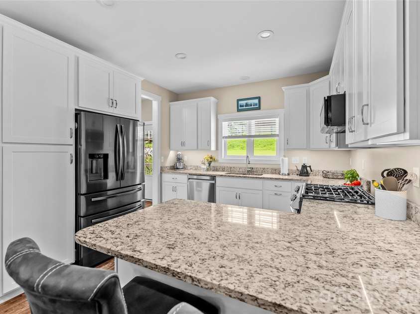 89 and 87 Greenwood Fields Drive, Asheville, NC 28804.  MLS# CAR4408441, YatesRealty ID 41273. 