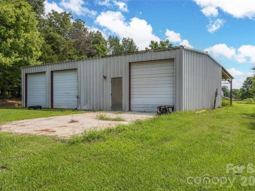 4988 Amick Lane, Liberty, NC 27298.  MLS# CAR4408844, YatesRealty ID 41277. Garage/workshop