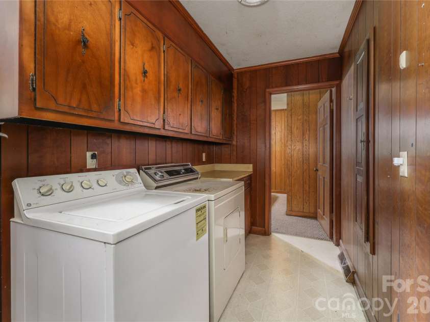 4988 Amick Lane, Liberty, NC 27298.  MLS# CAR4408844, YatesRealty ID 41277. Laundry