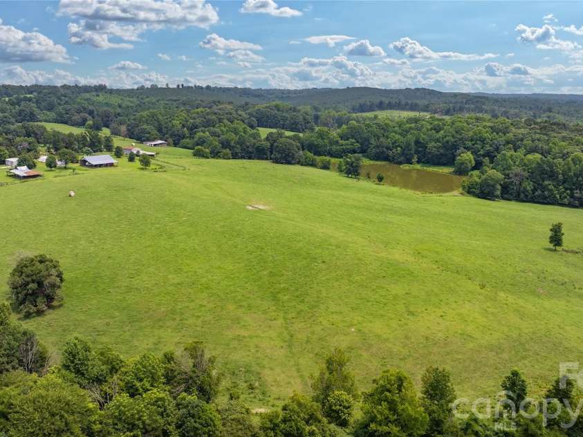 4988 Amick Lane, Liberty, NC 27298.  MLS# CAR4408844, YatesRealty ID 41277. Pasture on right side