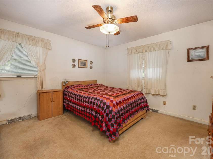 4988 Amick Lane, Liberty, NC 27298.  MLS# CAR4408844, YatesRealty ID 41277. Primary bedroom