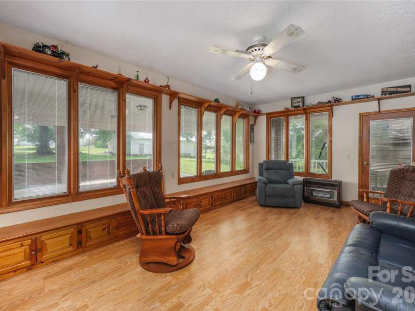 4988 Amick Lane, Liberty, NC 27298.  MLS# CAR4408844, YatesRealty ID 41277. Sunroom