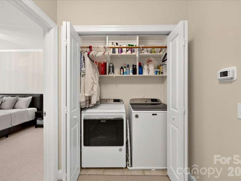4632 Dabney Vigor Drive, Charlotte, NC 28209.  MLS# CAR4405775, YatesRealty ID 41279. Laundry with built-in shelving