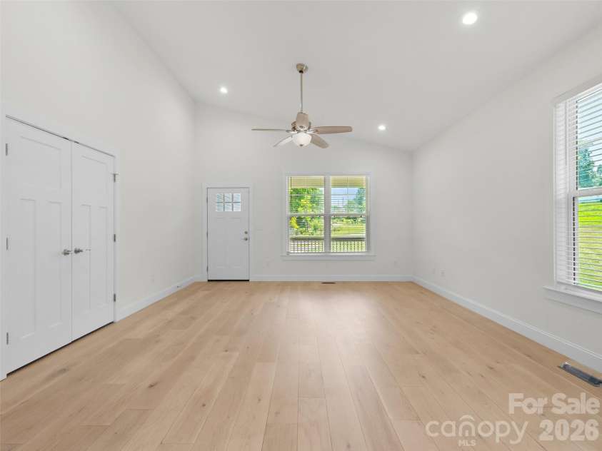 201 Mapleton Drive, East Flat Rock, NC 28726.  MLS# CAR4404187, YatesRealty ID 41286. Beautiful wide-plank flooring flows throughout the open-concept living areas, creating a modern yet comfortable atmosphere.