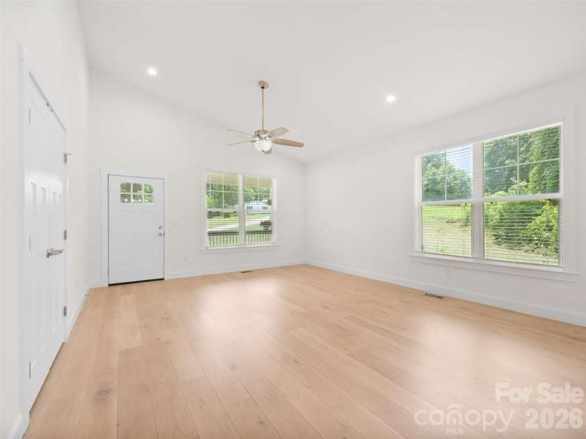 201 Mapleton Drive, East Flat Rock, NC 28726.  MLS# CAR4404187, YatesRealty ID 41286. The spacious layout allows for flexible furniture placement while maintaining an open, inviting feel perfect for everyday living and entertaining.