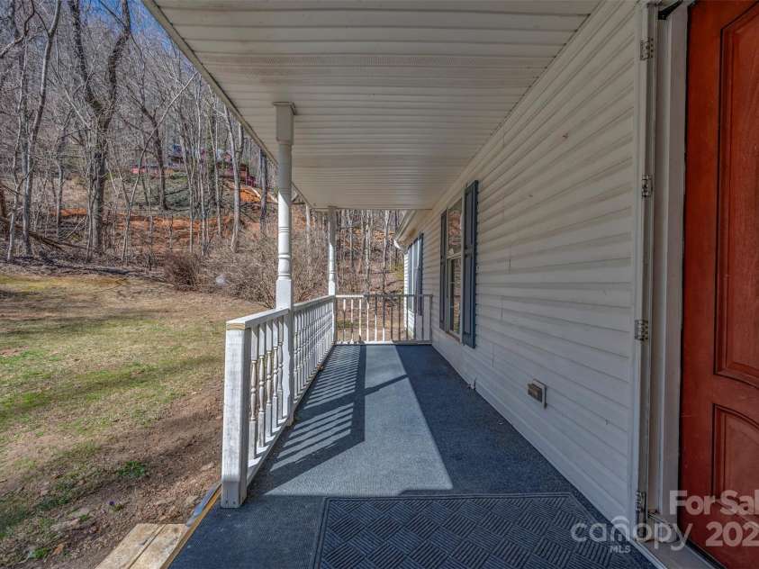 1058 Bearwallow Mountain Road, Hendersonville, NC 28792.  MLS# CAR4230448, YatesRealty ID 4129. 
