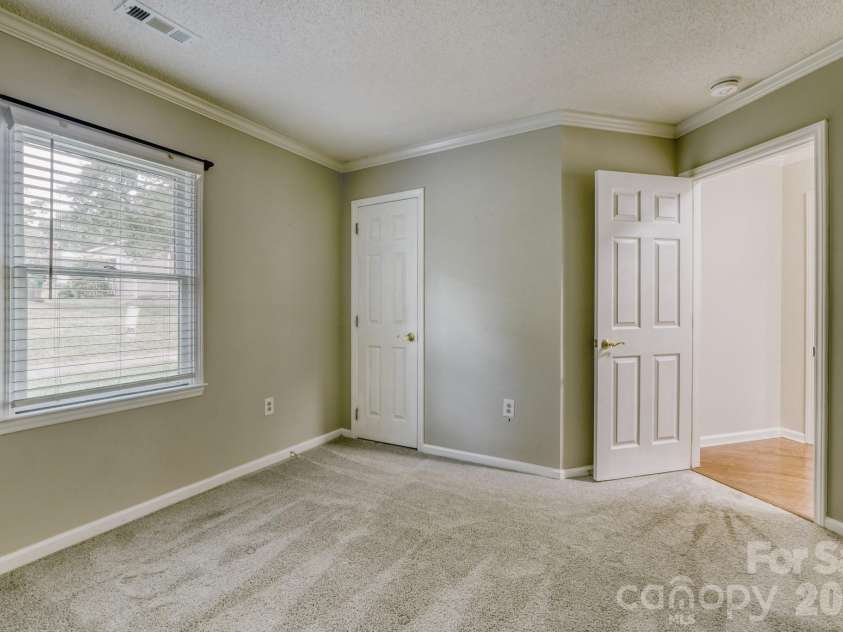 7333 Carrbridge Lane, Charlotte, NC 28226.  MLS# CAR4408852, YatesRealty ID 41294. Secondary bedroom