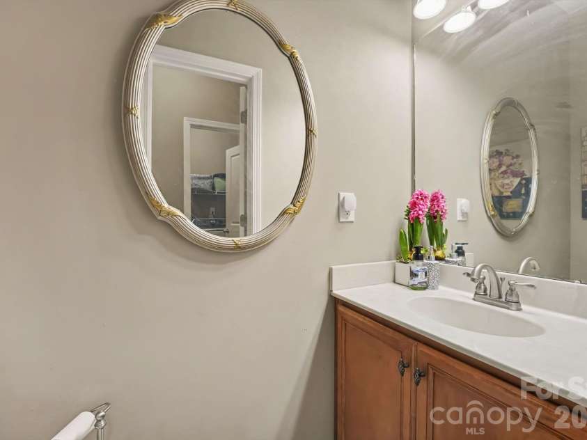 128 La Agua Lane, Troutman, NC 28166.  MLS# CAR4406062, YatesRealty ID 41295. Half bath on main
