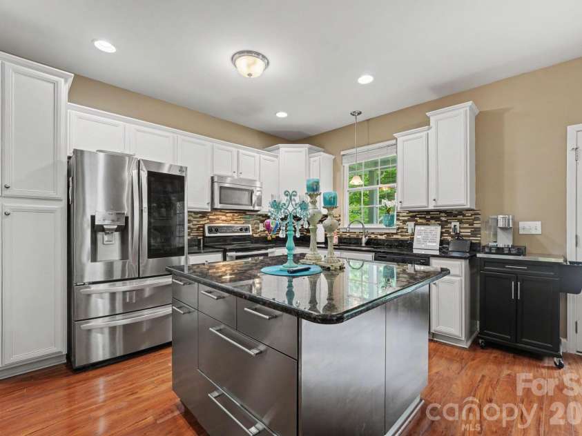 128 La Agua Lane, Troutman, NC 28166.  MLS# CAR4406062, YatesRealty ID 41295. Kitchen