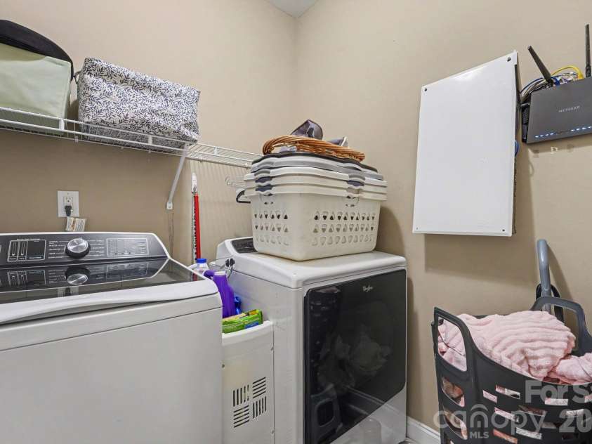 128 La Agua Lane, Troutman, NC 28166.  MLS# CAR4406062, YatesRealty ID 41295. Laundry on main