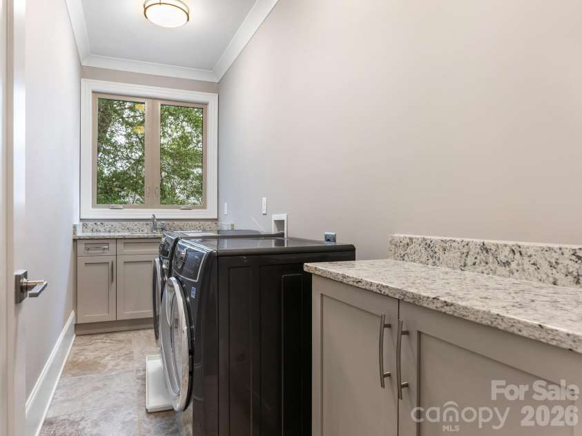 2011 Sharon Avenue, Charlotte, NC 28211.  MLS# CAR4409632, YatesRealty ID 41300. Laundry Room
