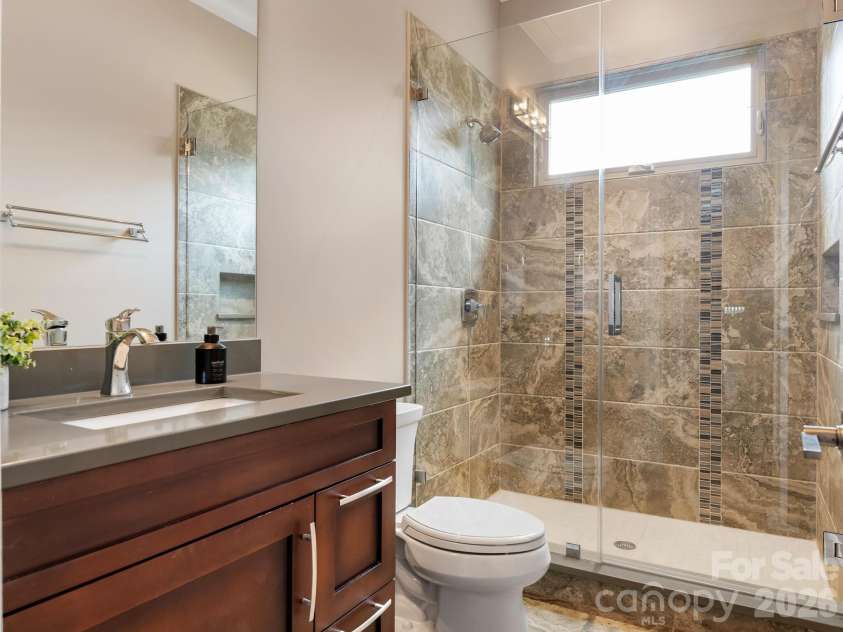 2011 Sharon Avenue, Charlotte, NC 28211.  MLS# CAR4409632, YatesRealty ID 41300. Main Level Full Bathroom