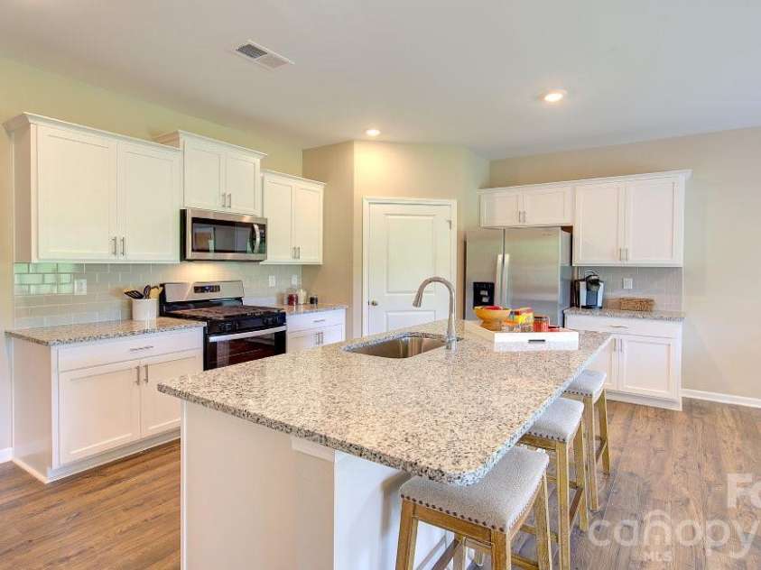 159 Piney Woods Road, Fletcher, NC 28732.  MLS# CAR4409286, YatesRealty ID 41302. Photos are representative