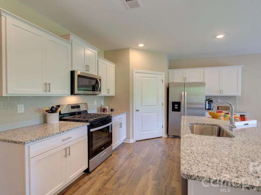 159 Piney Woods Road, Fletcher, NC 28732.  MLS# CAR4409286, YatesRealty ID 41302. Photos are representative