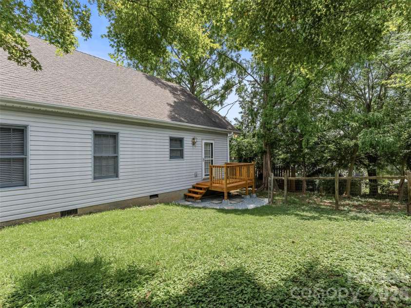 66 Hyde Avenue, Tryon, NC 28782.  MLS# CAR4403009, YatesRealty ID 41303. Fenced Back Yard