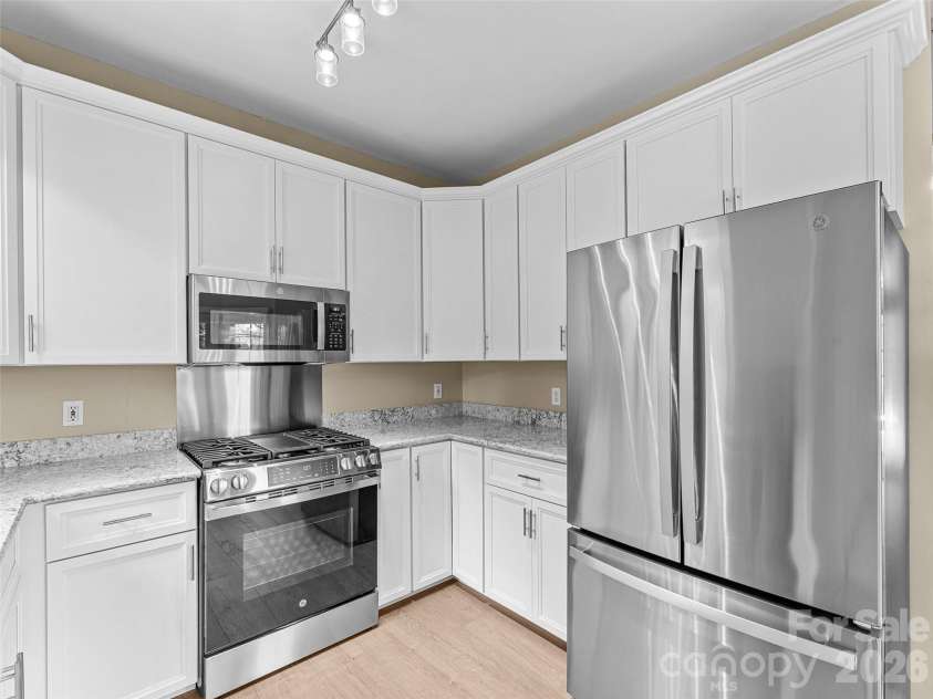 66 Hyde Avenue, Tryon, NC 28782.  MLS# CAR4403009, YatesRealty ID 41303. Gas range & Refrigerator has Ice Maker