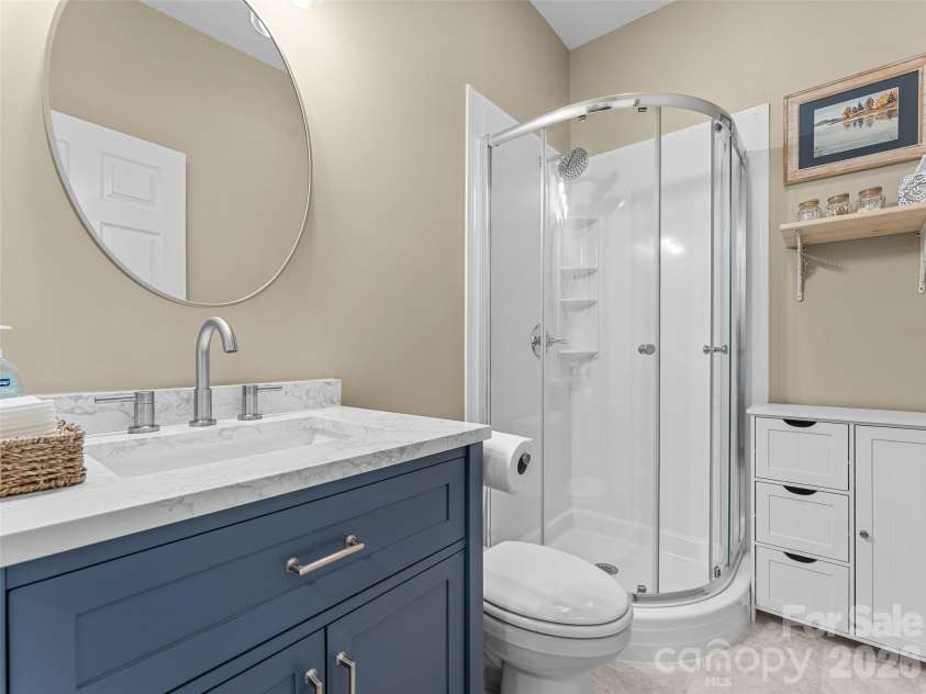 66 Hyde Avenue, Tryon, NC 28782.  MLS# CAR4403009, YatesRealty ID 41303. Guest Bath