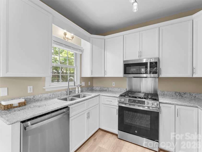 66 Hyde Avenue, Tryon, NC 28782.  MLS# CAR4403009, YatesRealty ID 41303. Inviting kitchen
