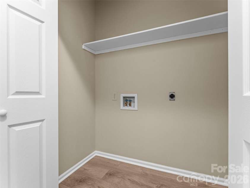 66 Hyde Avenue, Tryon, NC 28782.  MLS# CAR4403009, YatesRealty ID 41303. Laundry Closet